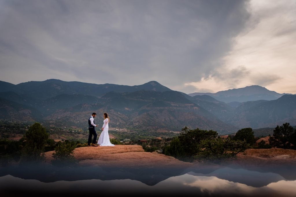 a couple exchanges vows at Garden of the Gods