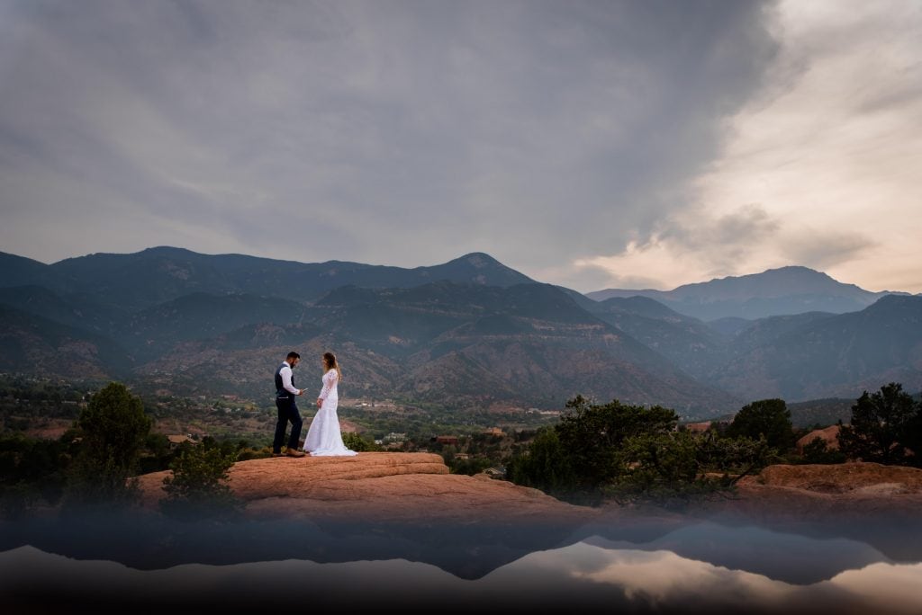 a couple exchanges vows at Garden of the Gods 