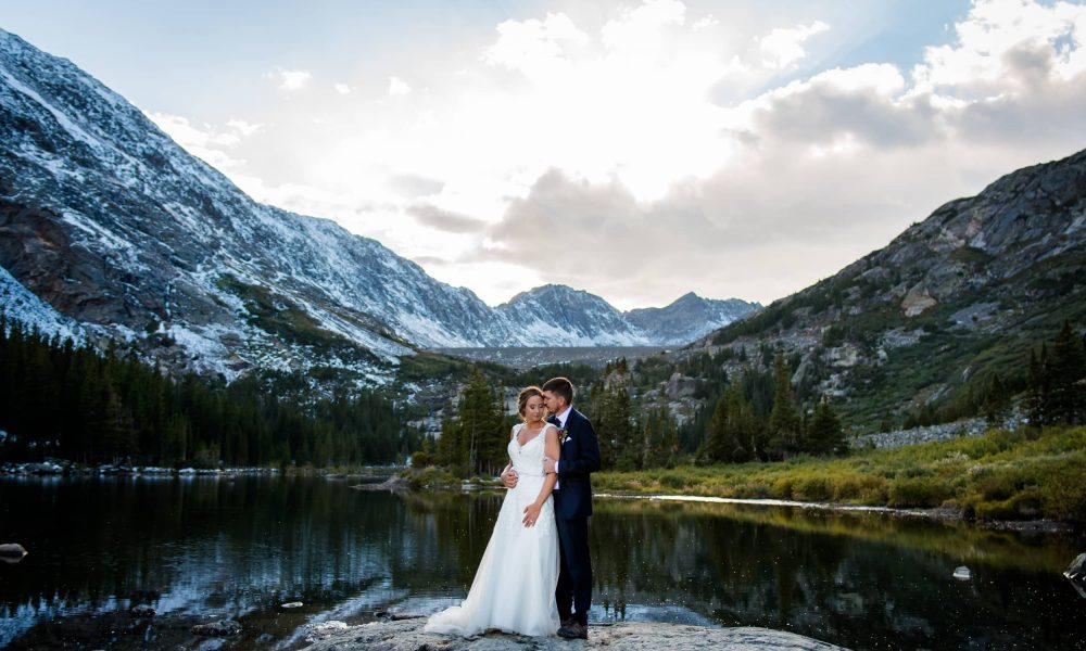 a couple basks in the last light of the day at their Breckenridge Elopement