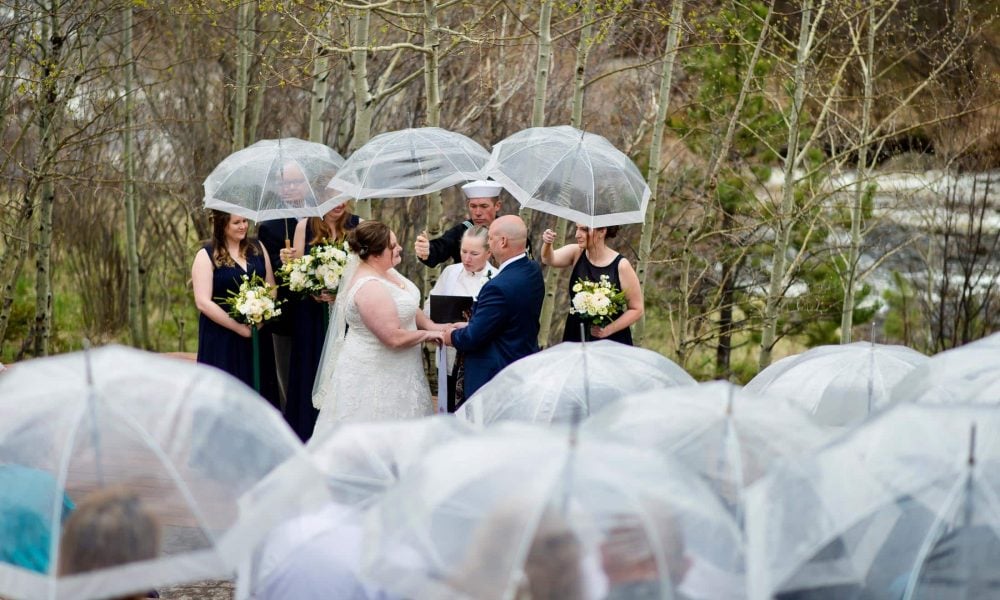 Outdoor Wedding in the rain at Wild Basin Lodge near Estes Park, Colorado