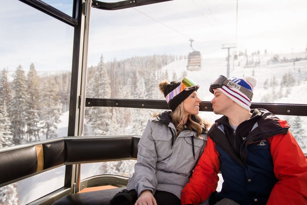 Snowboarders in a Gondola for Engagement Photos in Vail, Colorado