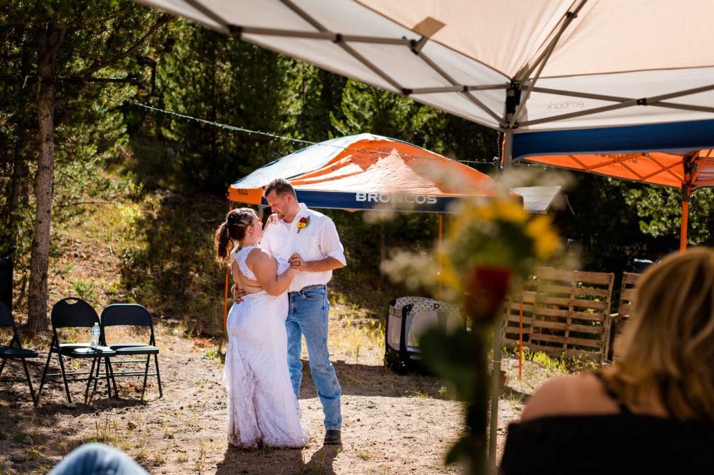 A couple dances at their backyard wedding in Tabernash