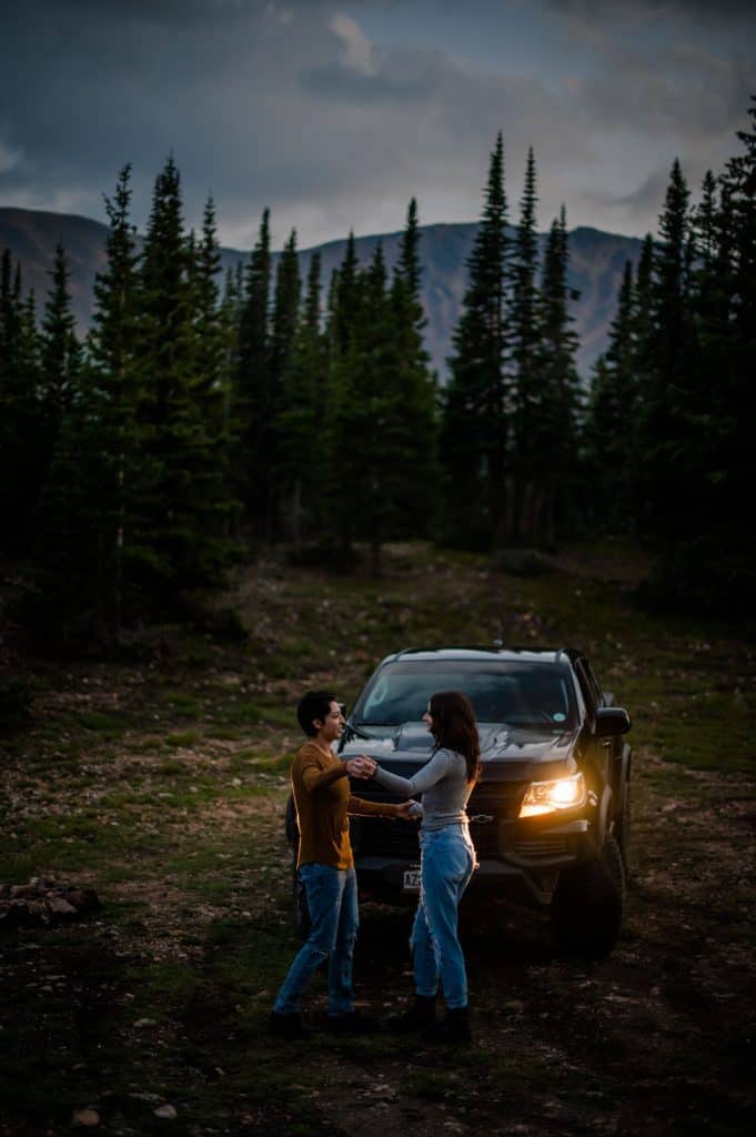 a couple adventures with their truck in the Colorado high country planning for their elopement 