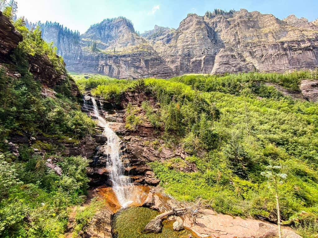 hike to a waterfall and set up a picnic overlooking it for an adventurous date day