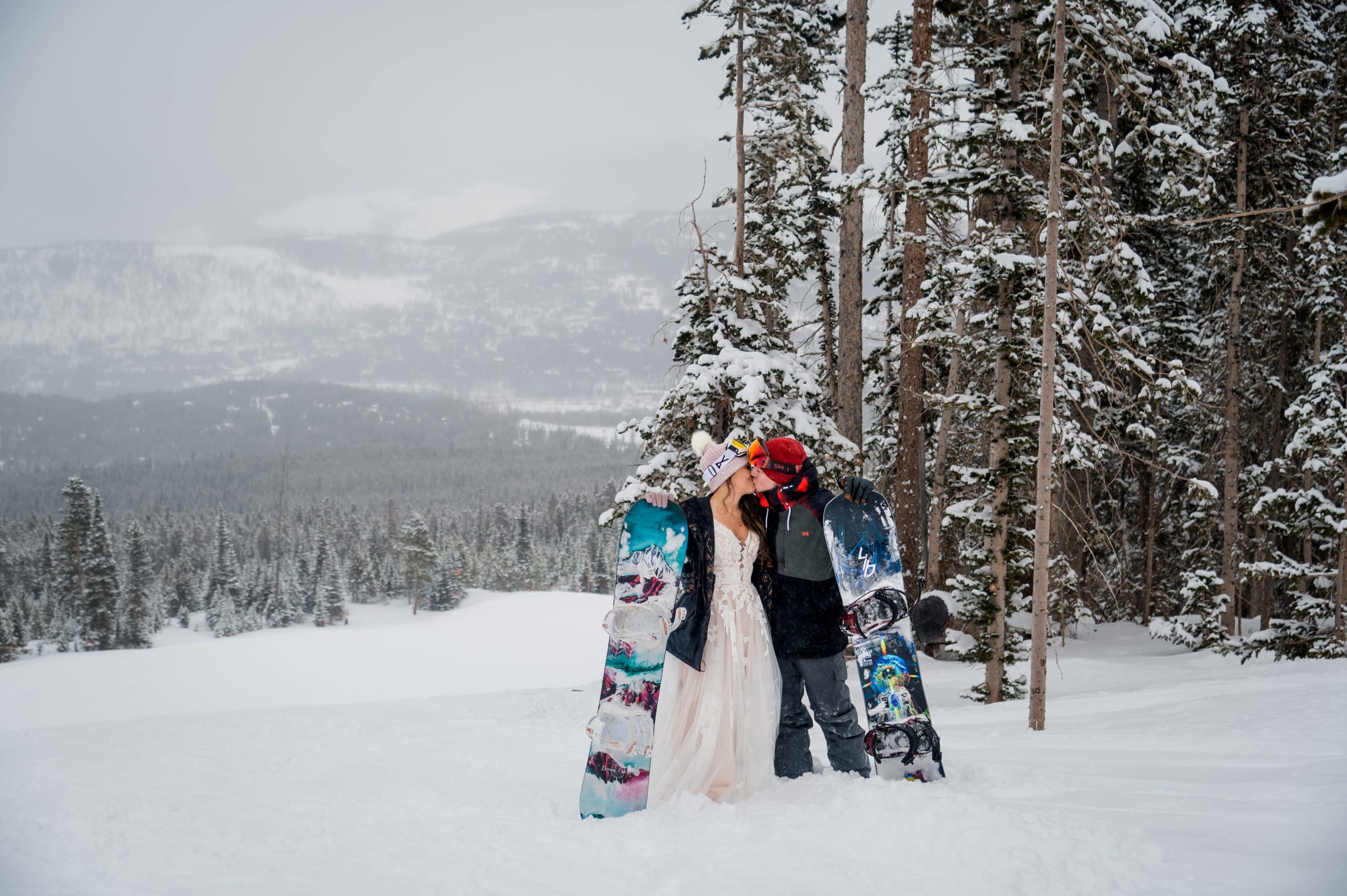 A couple snowboards for their elopement in Colorado
