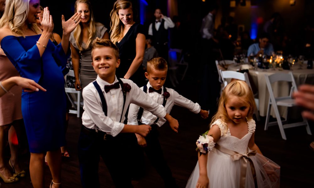 kids dance at a wedding reception at the pines at genesee in colorado