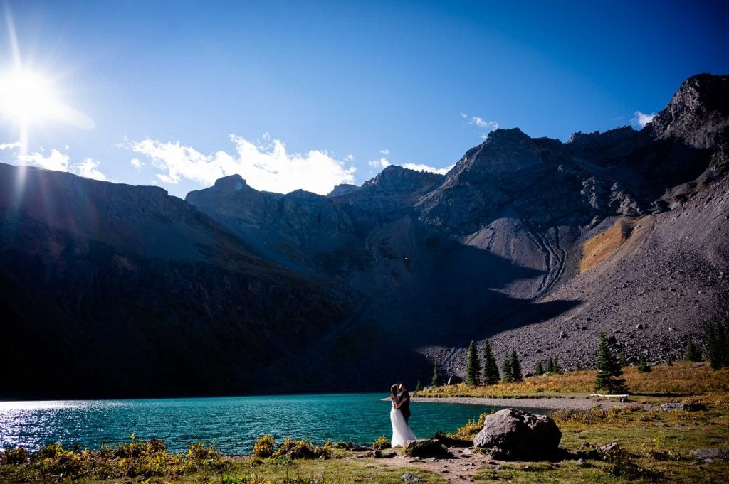 Colorado elopement photographer documents a couple near blue lakes in ridgway