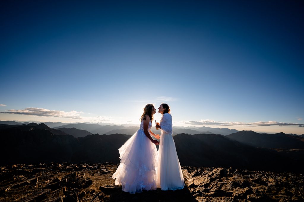 Colorado elopement photographer documents two brides on top of a 14er eloping in Colorado