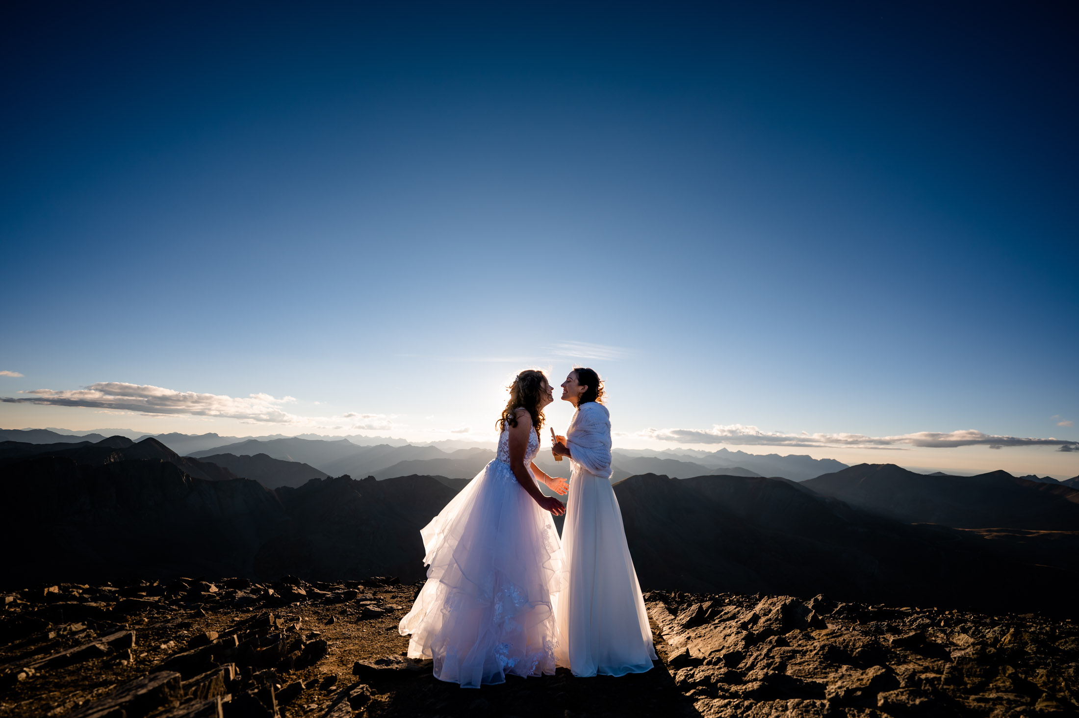 Colorado elopement photographer documents two brides on top of a 14er eloping in Colorado