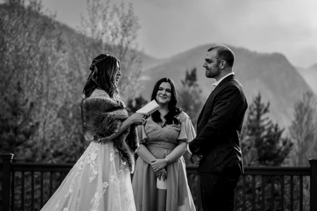 a couple shares their vows at the beautiful ceremony site of the Frisco Adventure park