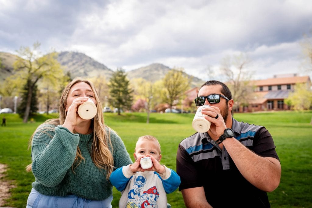 a family drinks together at their candid lifestyle session in Golden, CO